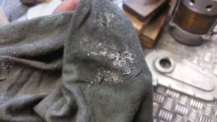 Mashed metal from ball bearing