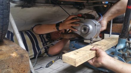 The rather hard job of getting the motor and gears back in place