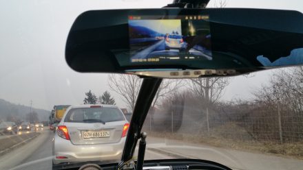 TW560's dashcam front and back cameras visible