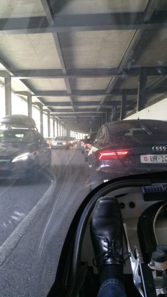 Lots of cars trying to avoid the traffic jam on the motorway