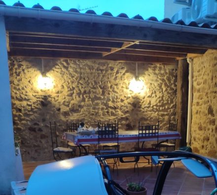 Breakfast in the courtyard with a TWIKE in view