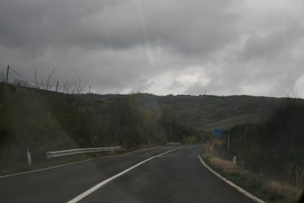 Rolling hills and dark clouds